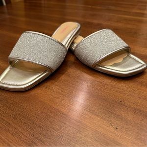 Stuart Weitzman gold glitter flat sandal, size 8. Never worn.